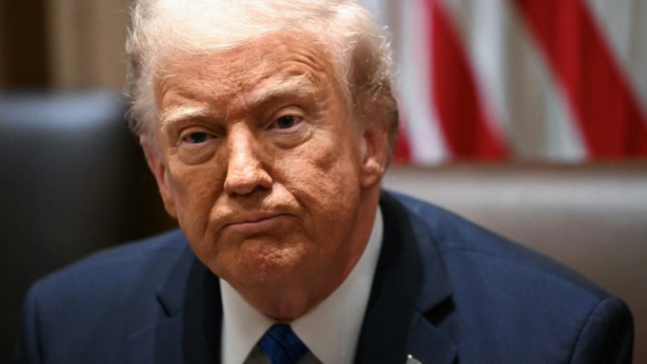 US President Donald Trump said he would 'look into' the use of the Signal app and has put on a united front