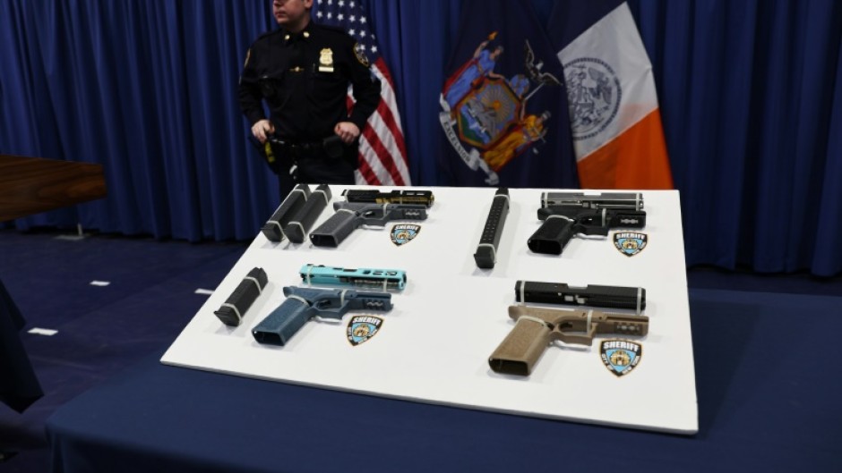 Confiscated 'ghost guns' displayed at a news conference in New York by city officials