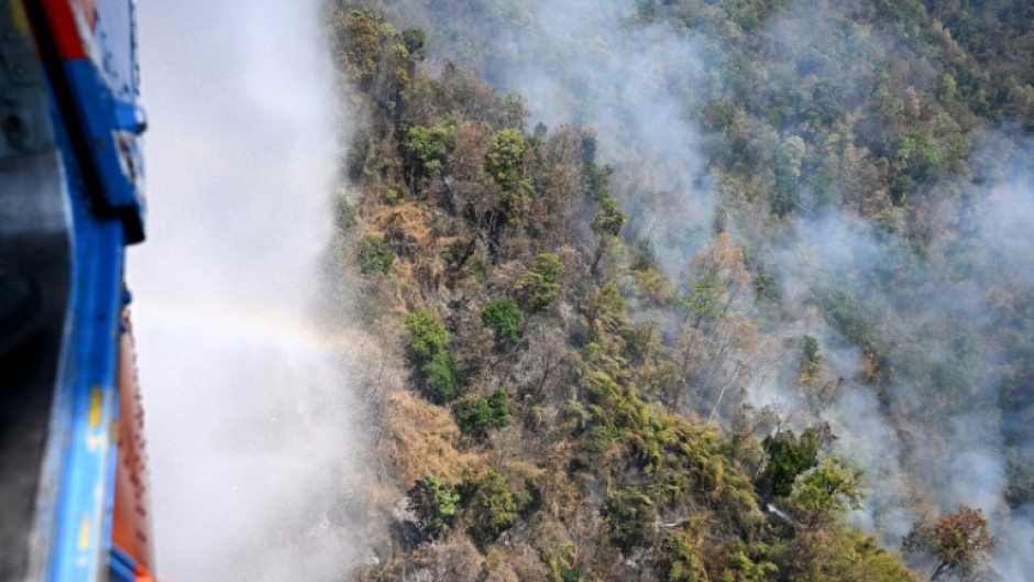 Levels of PM2.5 pollutants -- dangerous cancer-causing microparticles small enough to enter the bloodstream through the lungs -- were almost 15 times the World Health Organization's recommended limit in Chiang Mai on Thursday