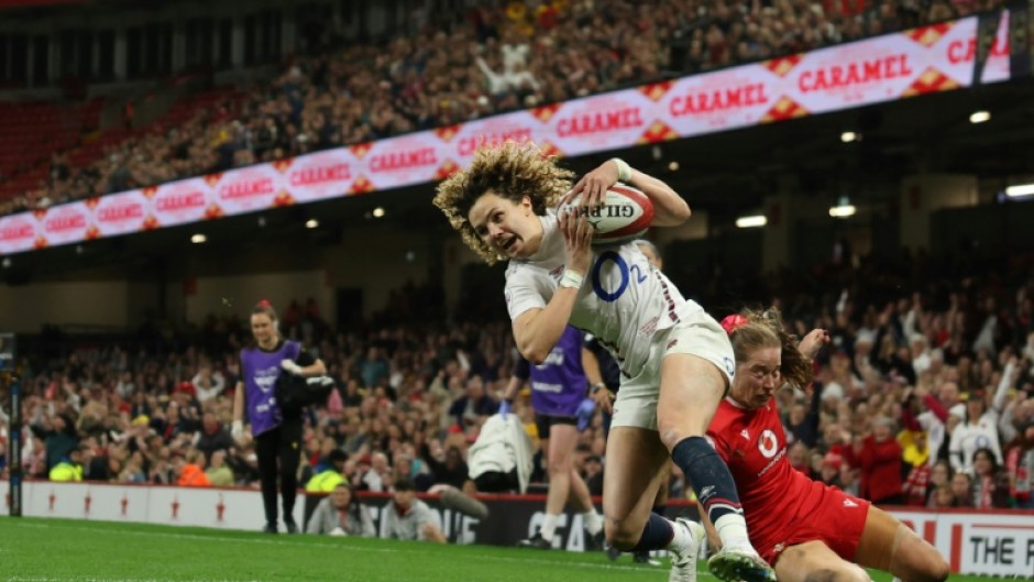 Try time: England full-back Ellie Kildunne scores one of her three tries in a Women's Six Nations win over Wales in Cardiff