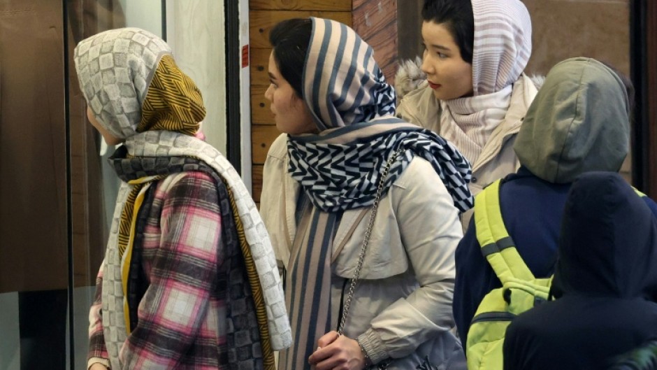 Iranian women have also pushed the boundaries by allowing the head covering to slide back