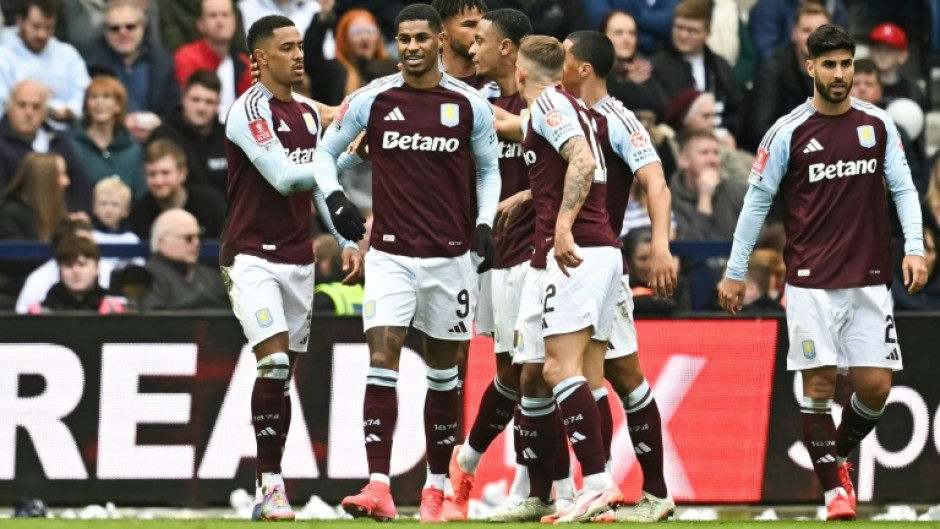 Aston Villa's Marcus Rashford celebrates after scoring against Preston