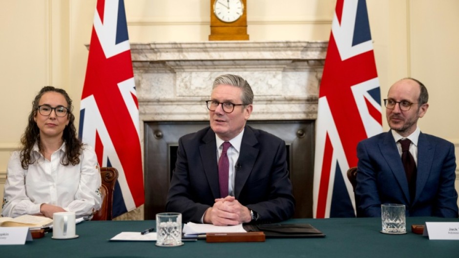 UK Prime Minister Keir Starmer, centre, with Sarah Simpkin from the Children's Society and writer Jack Thorne of the Netflix drama 'Adolescence'