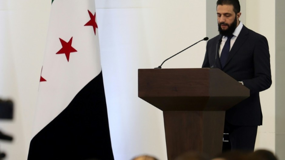 Syria's interim President Ahmed al-Sharaa delivers a speech in Damascus on March 29, 2025