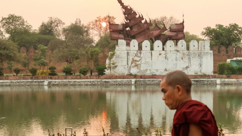 The ruling junta has asked the population to hold a minute's silence after a devastating earthquake