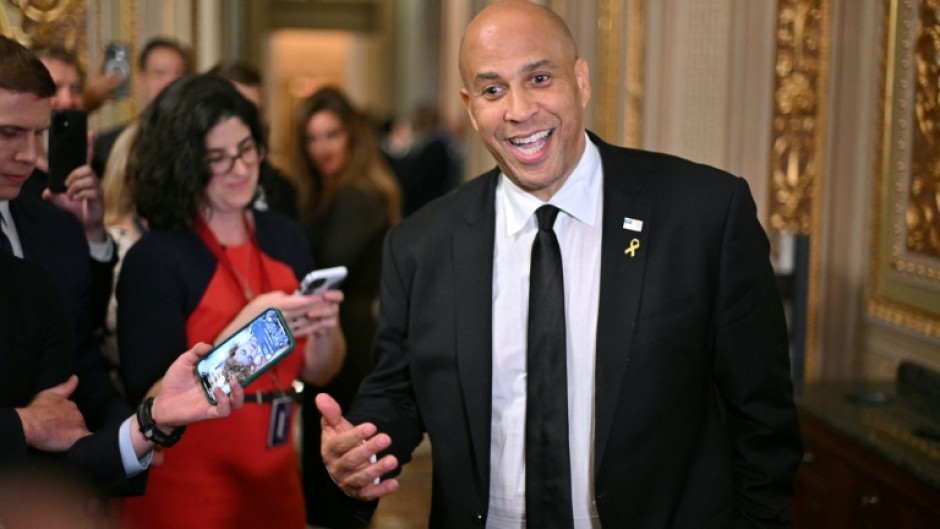Cory Booker spoke to journalists after finishing his Senate floor endurance feat