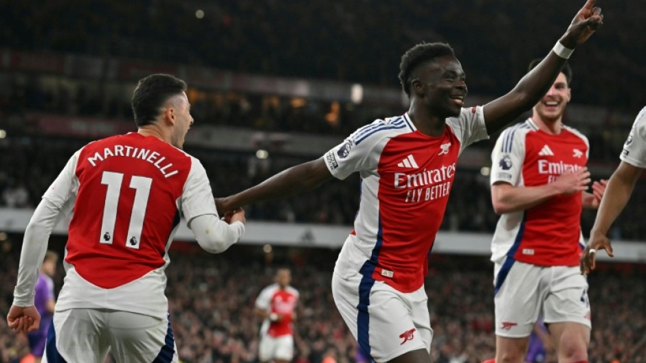 Bukayo Saka (centre) scored on his return from injury in Arsenal's 2-1 win over Fulham
