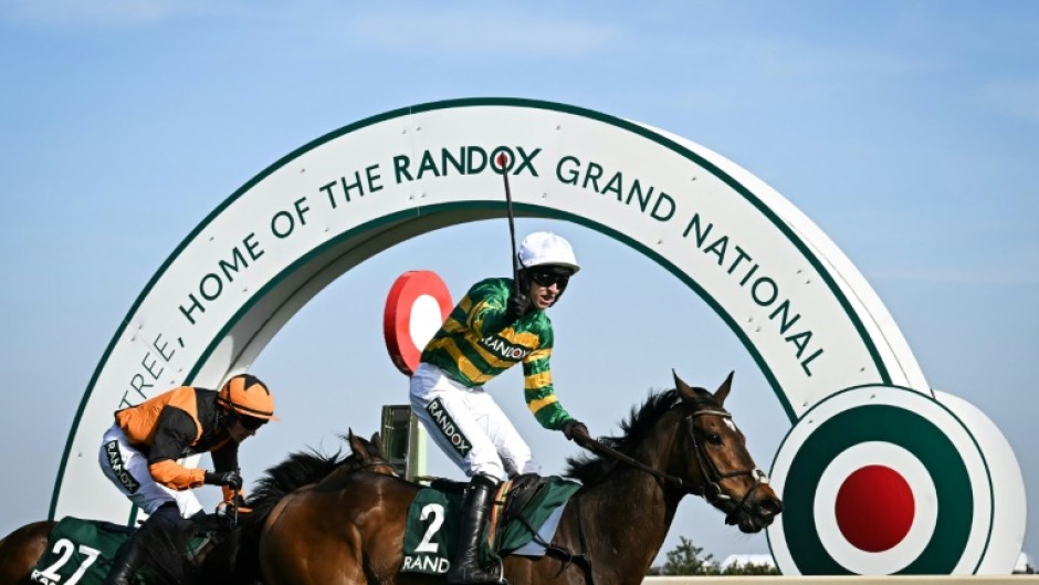 Mark Walsh enjoys that winning feeling after partnering Gentleman De Mee to victory in the Topham Chase over the Grand National fences