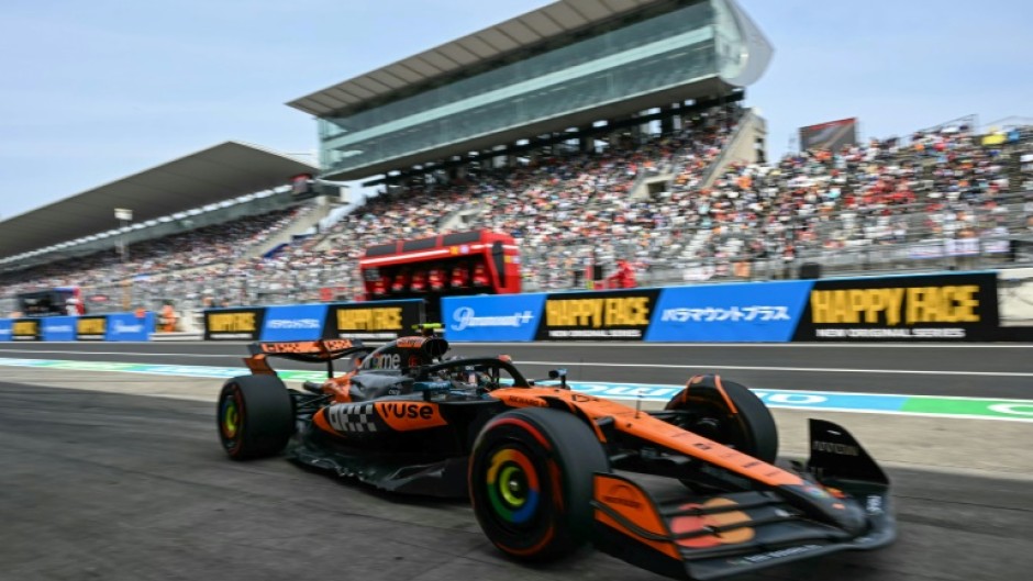 McLaren's British driver Lando Norris returns to the pits