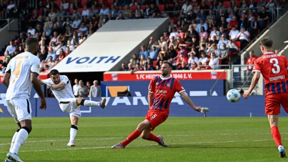 Emiliano Buendia (2nd L) scored a 91st-minute winner for Bayer Leverkusen at Heidenheim