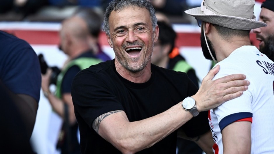 Luis Enrique in celebratory mood after PSG clinched the Ligue 1 title on Saturday