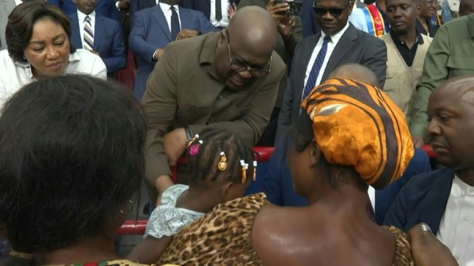 DR Congo's Tshisekedi visits flood victims at gymnasium in capital