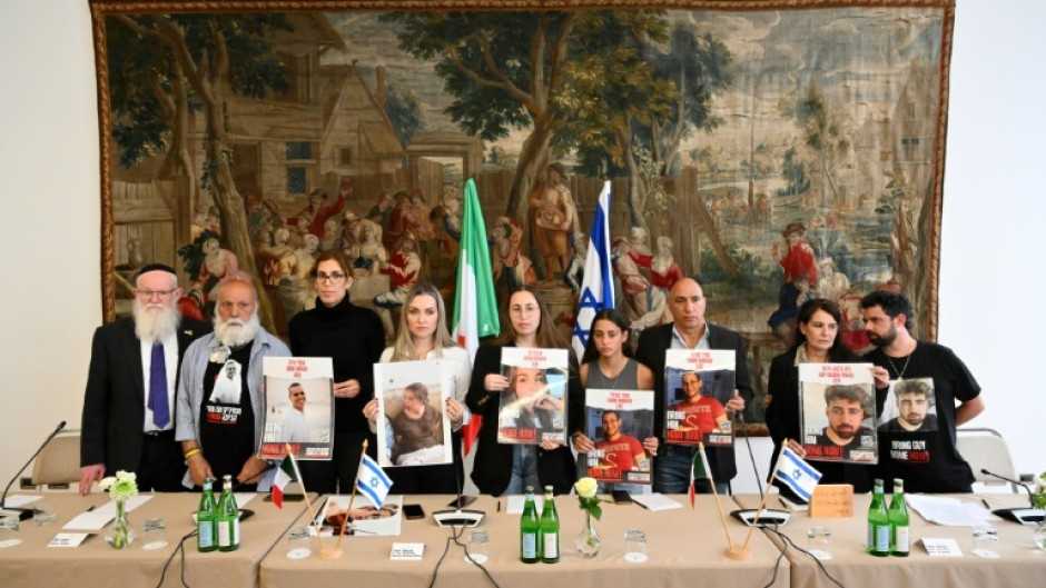 Relatives of Israeli hostages, including Tamir Nimrodi, give a press conference on April 8, 2024 in Rome