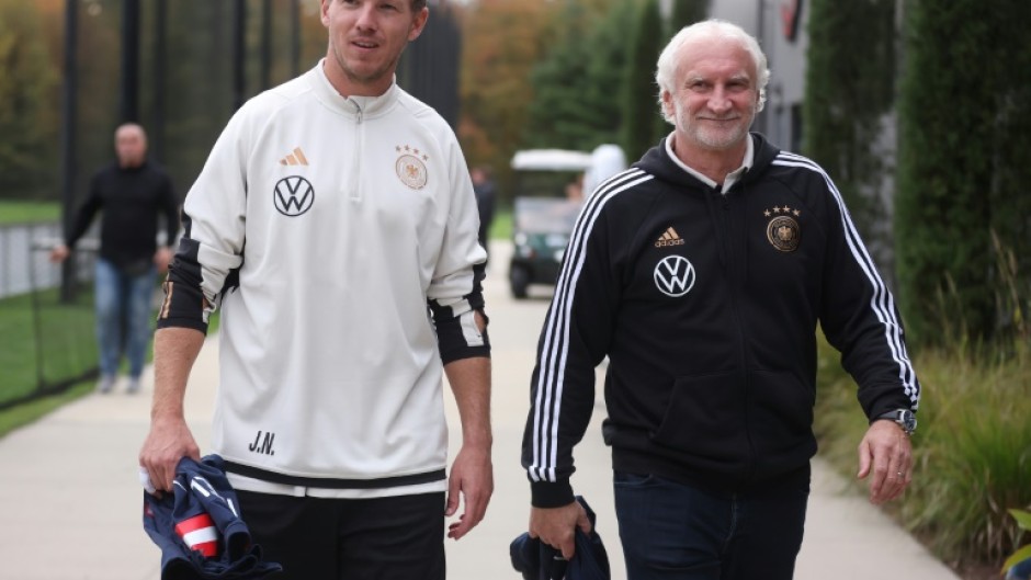 Rudi Voller (R) will continue his partnershipp with Julian Nagelsmann (L) with the German national team at least until Euro 2028