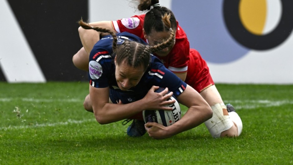 Emilie Boulard dives over the line to score for France against Scotland