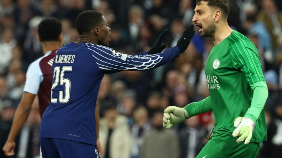 Goalkeeper Gianluigi Donnarumma (R) needed to be at his best as Paris Saint-Germain held on against Aston Villa on Tuesday to reach the Champions League semi-finals