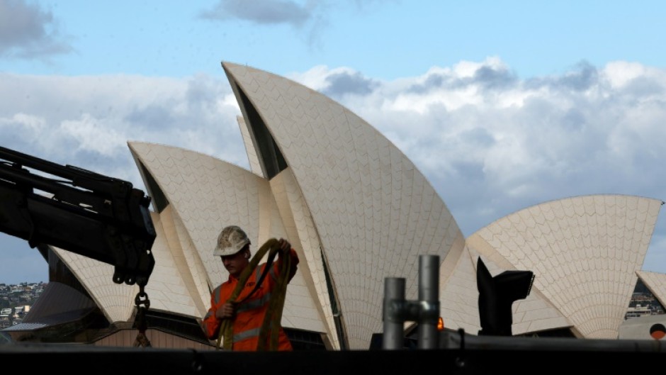 Prime Minister Anthony Albanese promised to defend Australia's interests in its trade tussle with the United States during a televised election debate with opposition leader Peter Dutton