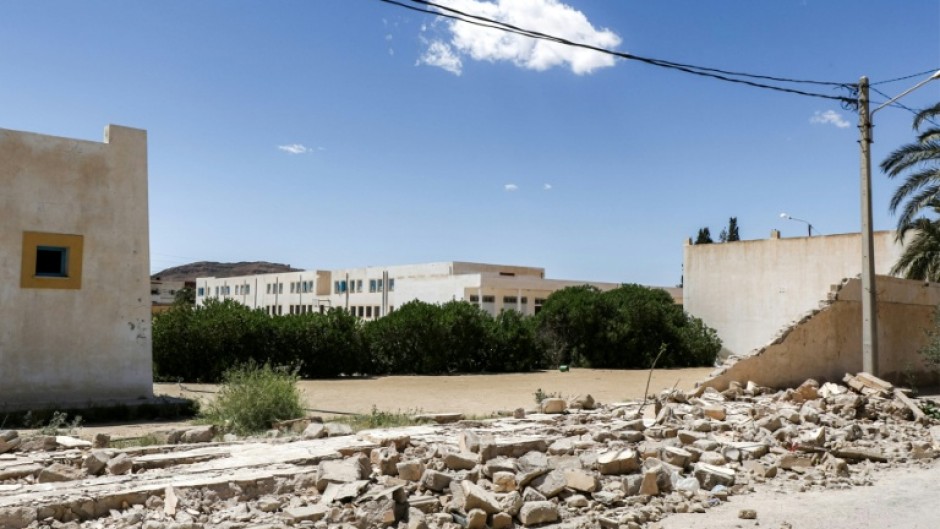 Residents of Mezzouna say it took first responders too long to reach the town after the school wall collapsed, crushing three young adults.