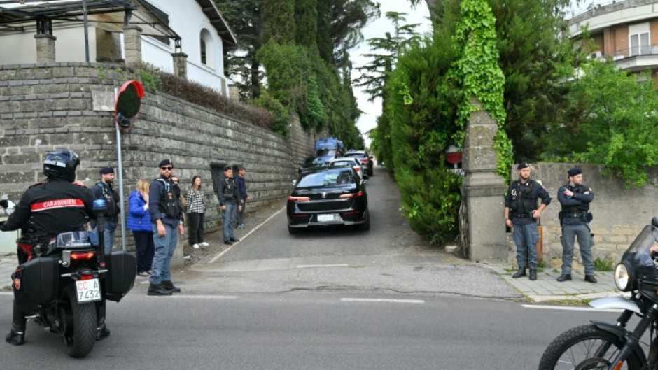 Vehicles escorted by Italian police enter the Omani embassy in Rome