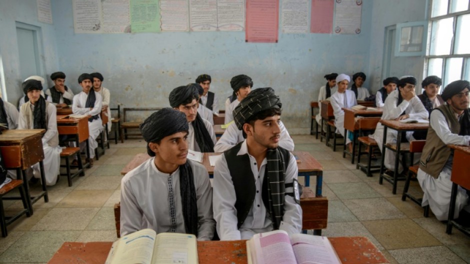 Afghan boys are now required to wear a turban or hat and shalwar kameez in school under new rules from the Taliban authorities