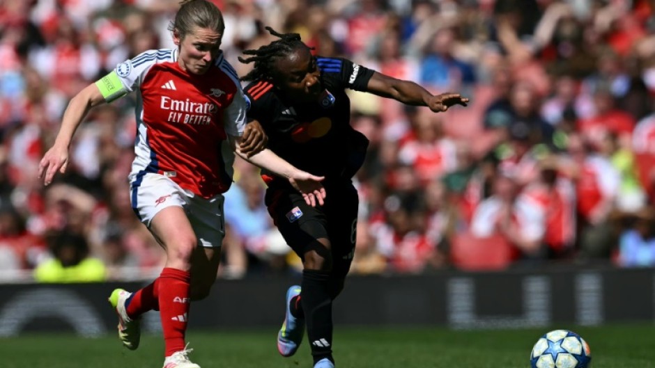 Lyon midfielder Melchie Dumornay (R) scored against Arsenal in the Women's Champions League