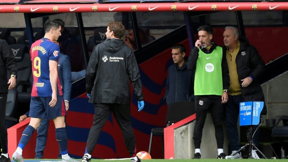 Barcelona's Polish forward Robert Lewandowski went off hurt against Celta Vigo on Saturday