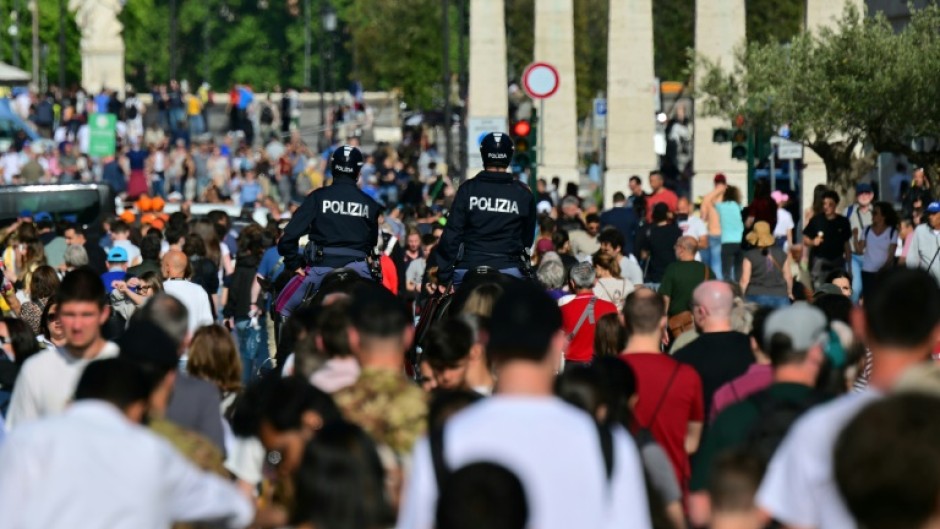 Crowds in a Rome street near the Vatican, a day after Pope Francis's death