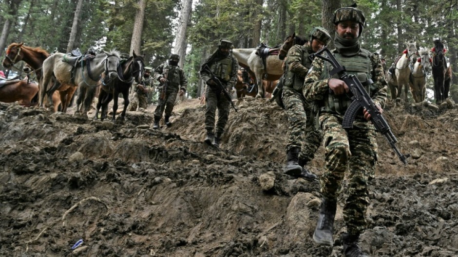 Indian soldiers are scouring the region for the attackers who killed 26 men on Tuesday