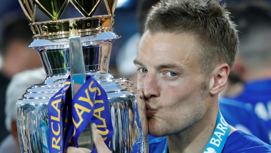 Leicester's Jamie Vardy kisses the Premier league trophy in May 2016