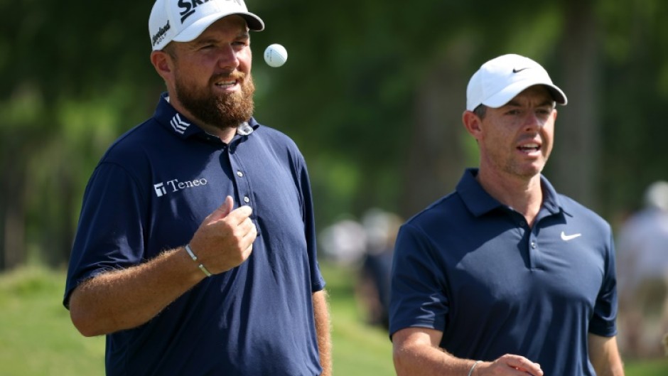 Defending champions Shane Lowry, left, and Rory McIlroy, right, combined to fire a 69 to move into contention after two rounds of the PGA Zurich Classic