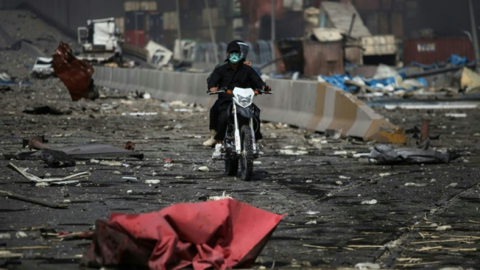 The blast carpeted a boulevard with debris