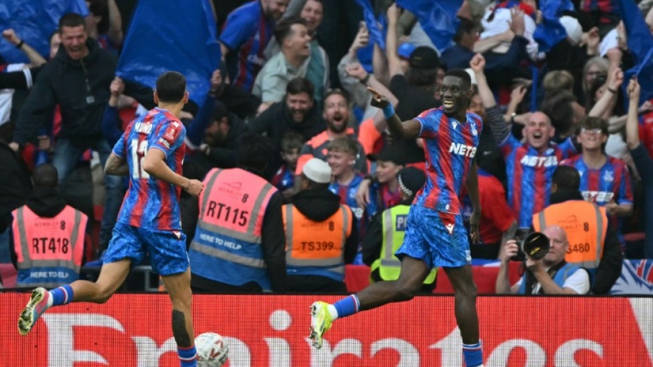 Crystal Palace's Ismaila Sarr (R) celebrates after scoring against Aston Villa