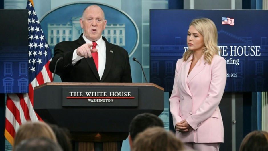 White House 'border czar' Tom Homan speak as White House Press Secretary Karoline Leavitt looks on during the daily briefing in the Brady Briefing Room of the White House in Washington, DC, on April 28, 2025