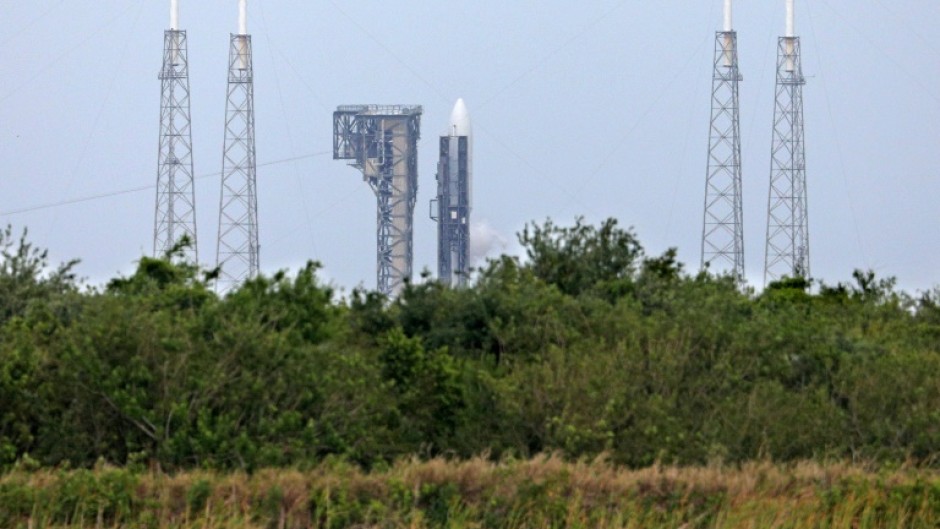 An Atlas V rocket of United Launch Alliance (ULA) is seen fueling at Space Launch Complex 41 at the Kennedy Space Center in Cape Canaveral, Florida, at dusk on April 9, 2025