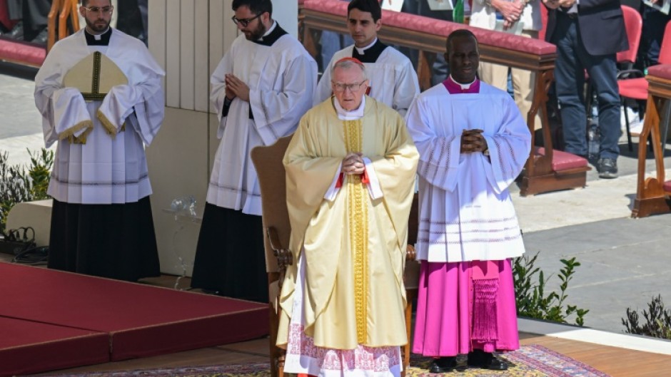Cardinal Pietro Parolin (C) played a key role in mediating a thaw between the United States and Cuba, as well as making a key Vatican agreement with China
