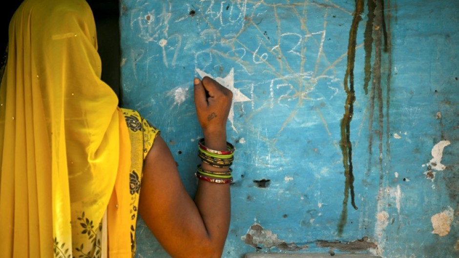 A woman from a marginalised community in the outskirts of Agra; more than two-thirds of India's 1.4 billion people are estimated to be on the lower rungs of a millennia-old social hierarchy that divides Hindus by function and social standing