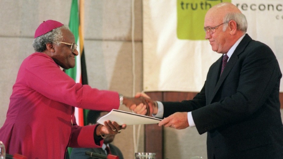 South Africa's last white president, FW de Klerk (right), made submissions to the commission led by Archbishop Desmond Tutu