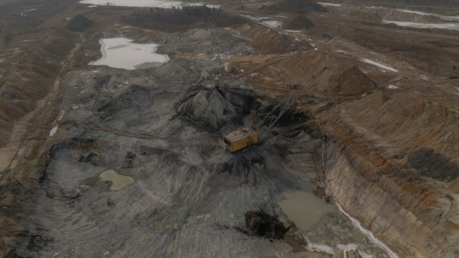 A dragline excavator operates in an open-pit titanium mine in the Zhytomyr region of Ukraine in February 2025