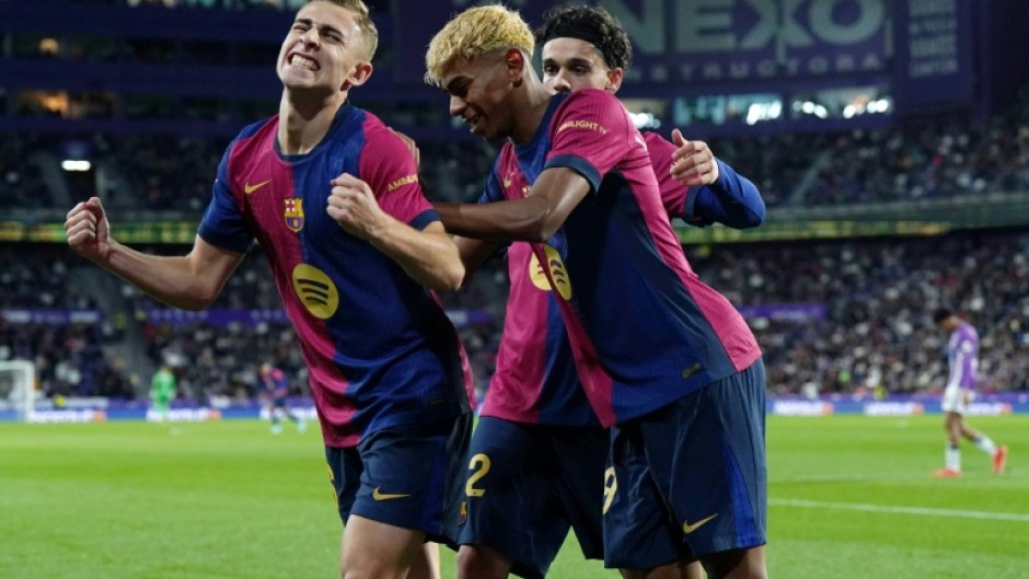 Barcelona midfielder Fermin Lopez celebrates scoring the winner against Valladolid