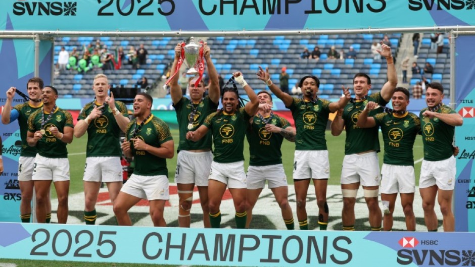 South Africa poses with the trophy after winning the Men's 2025 HSBC Rugby Sevens LA World Championship