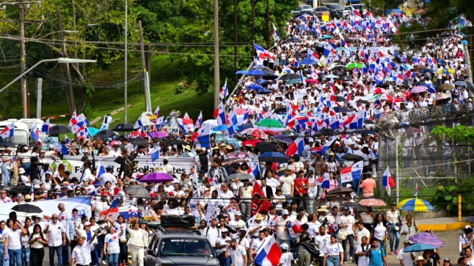 Thousands of government critics demonstrated in Panama City to protest a deal allowing the US military to deploy to bases around the Panama Canal, among other government policies