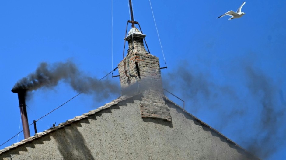 Black smoke rose from the chimney of the Sistine Chapel signalling that cardinals failed to elect a new pope