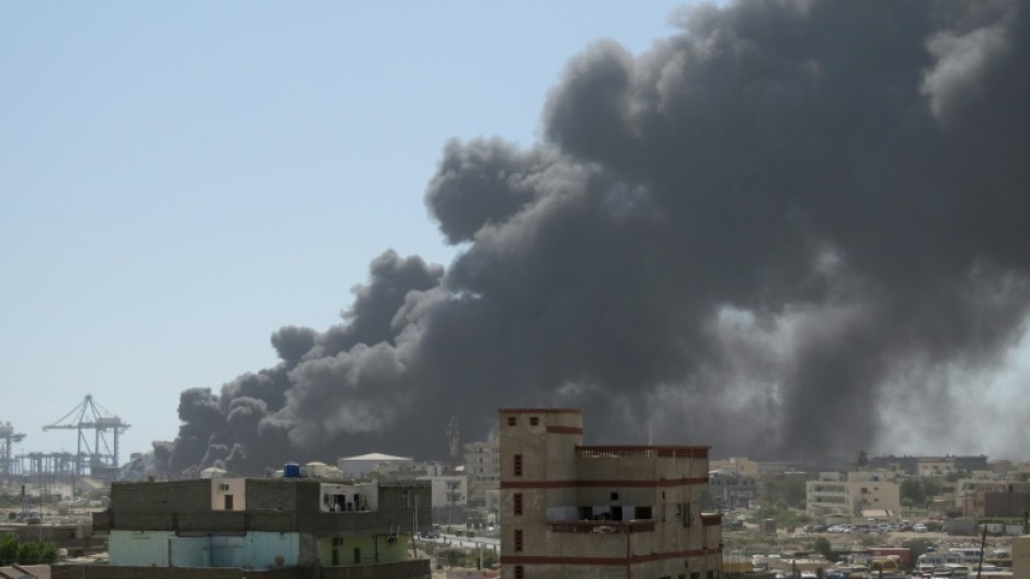 Smoke billows over Port Sudan after a paramilitary drone strike on the army-contolled aid hub on Tuesday.