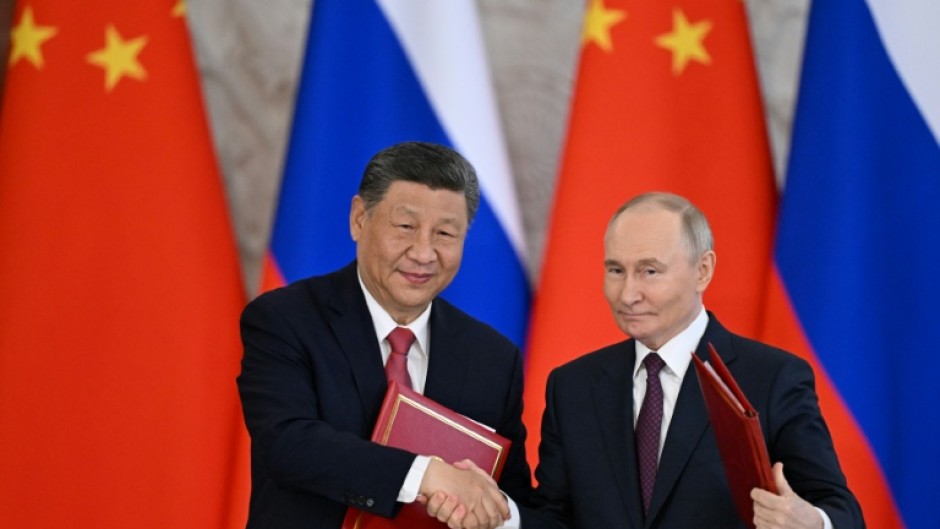 Xi said earlier that Beijing's ties with Moscow brought "positive energy" to a world in turmoil