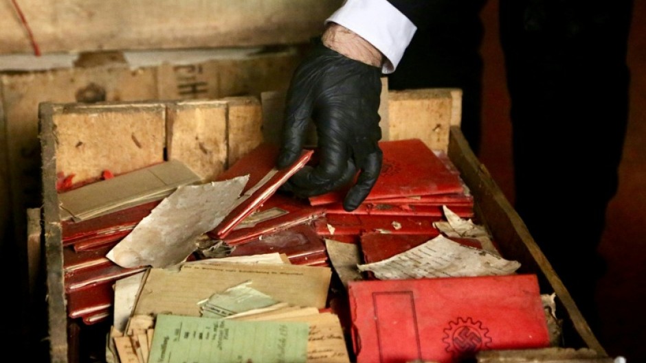 The crates contained Nazi-themed postcards, photographs, progapanda material, notebooks and party membership documents