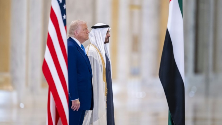 US President Donald Trump and the UAE's Sheikh Mohamed bin Zayed Al Nahyan stand for the national anthems at Qasr Al-Watan in Abu Dhabi
