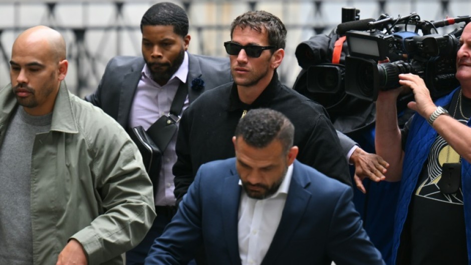 Alex Fine (C), Casandra Ventura's husband, was in attendance as she was cross-examined by attorneys for Sean Combs