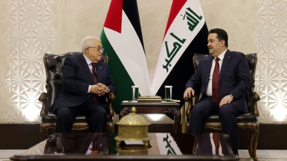 Iraqi Prime Minister Mohammed Shia al-Sudani (R) hold talks with Palestinian president Mahmud Abbas ahead of Saturday's Arab League meeting in Baghdad.