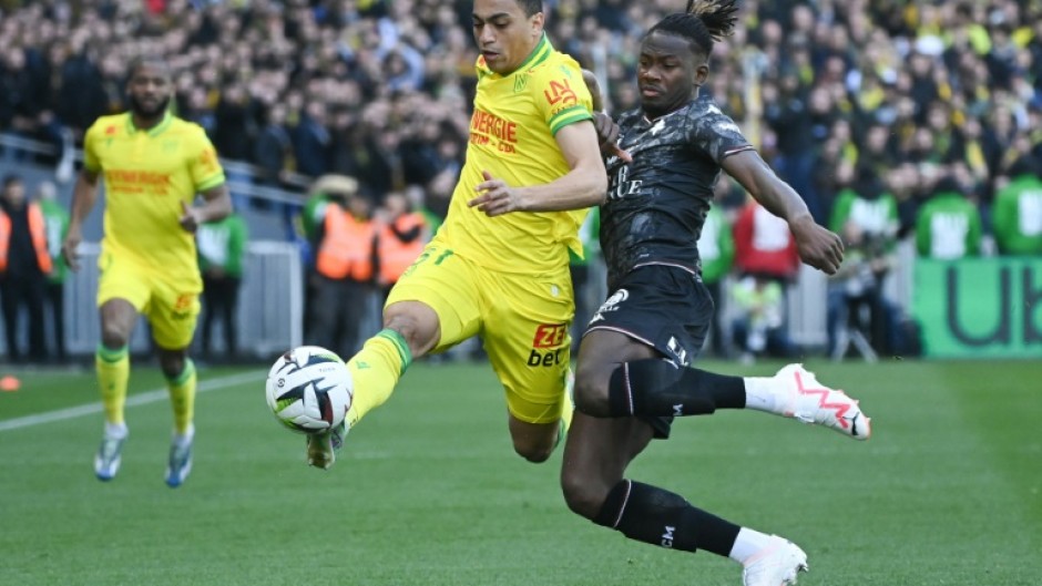 Mostafa Mohamed (L) will sit out Nantes' final match of the Ligue 1 season which takes place on the international day against homophobia