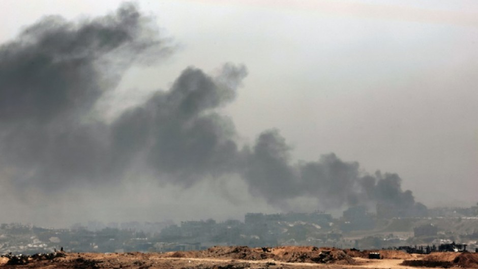 Smoke billows over the Gaza Strip after the Israeli military announced the start of an intensified operation in the territory